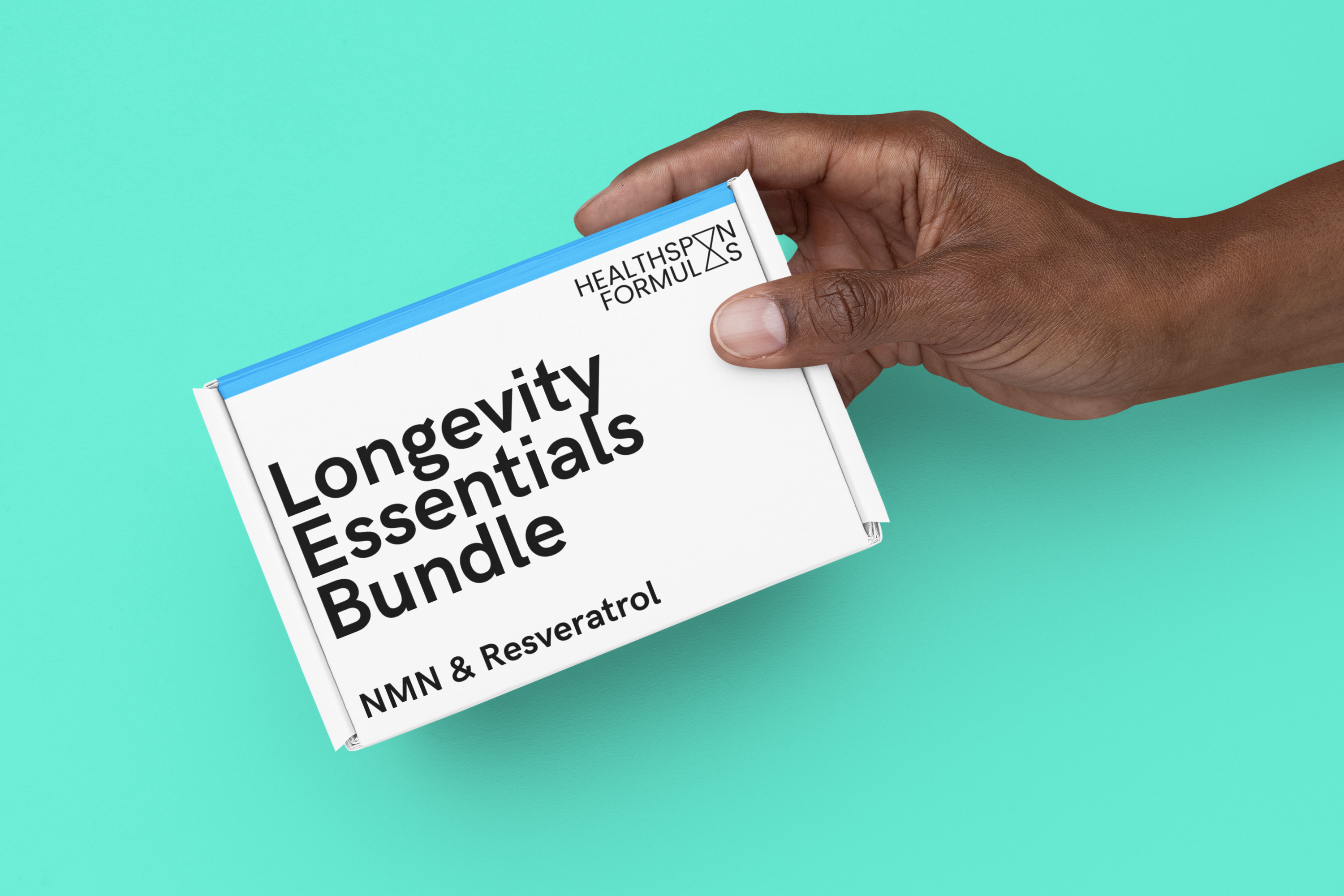 a man holding our longevity supplement bundle containing NMN and resveratrol